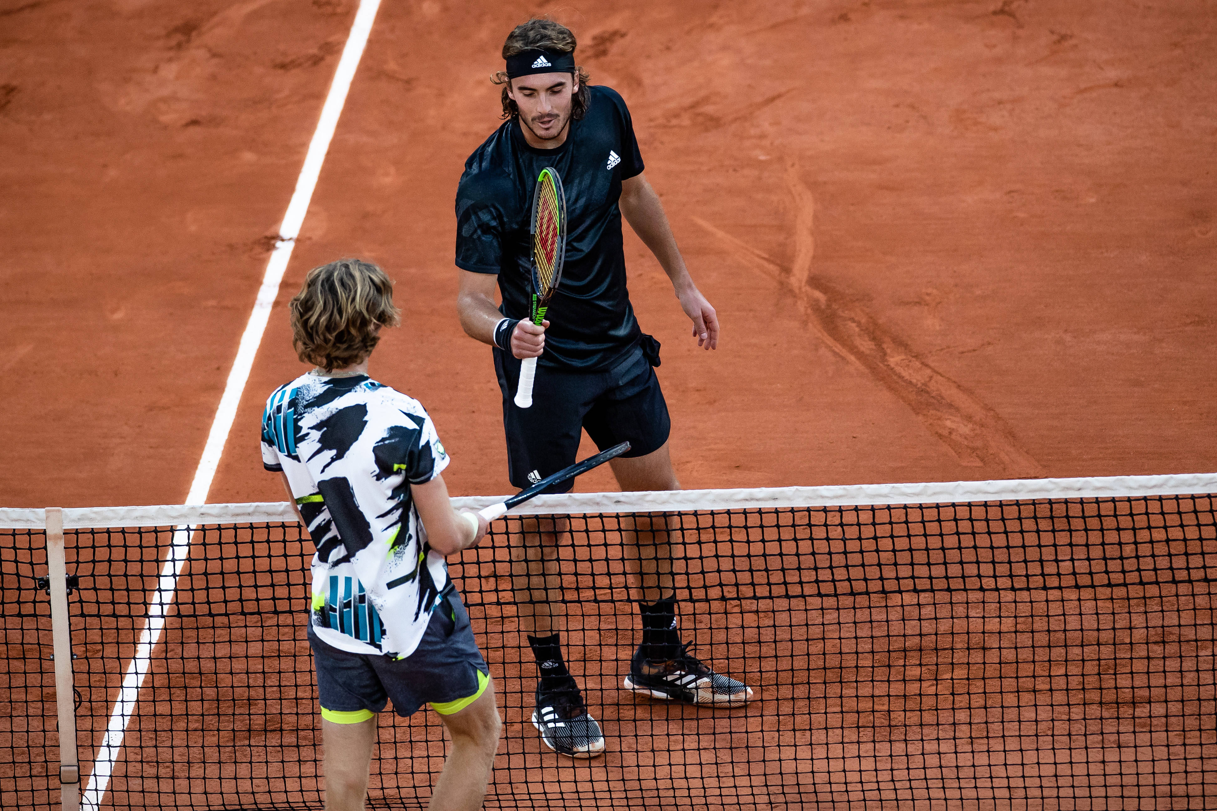 开云体育官网-意大利网球队爆冷法国网球队，西西帕斯关键制胜